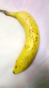 Ripe banana with spots